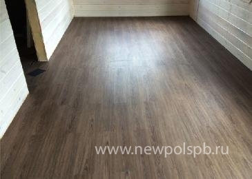Укладка виниловой плитки "Tarkett" Lounge и ламината в частном доме. Выборгское шоссе, 39 км.